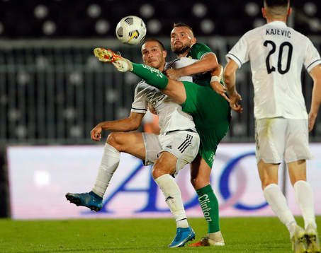 Mads Fenger  of Hammarby and Djordje Jovanovic of Cukaricki