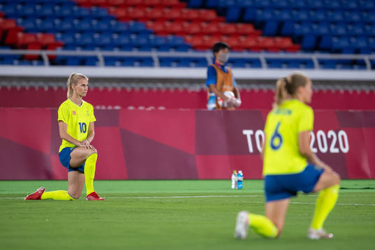Sofia Jakobsson of Sweden take a knee