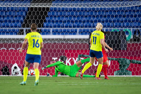 Stina Blackstenius of Sweden scores 1-0 behind goalkeeper
