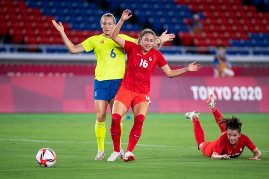 Magdalena Eriksson of Sweden and Janine Beckie and Jessie