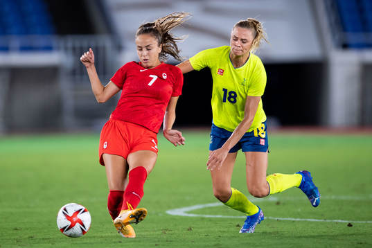 Julia Grosso of Canada and Fridolina Rolfö of Sweden in