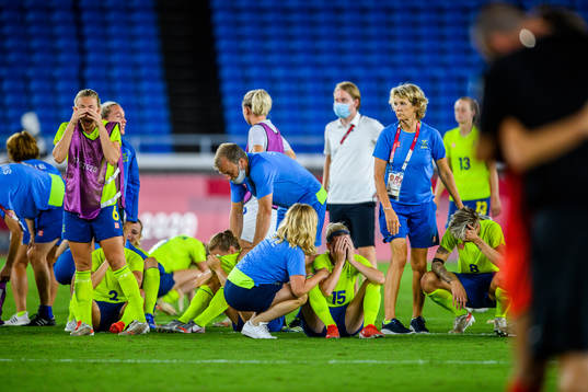 Players of Sweden look dejected