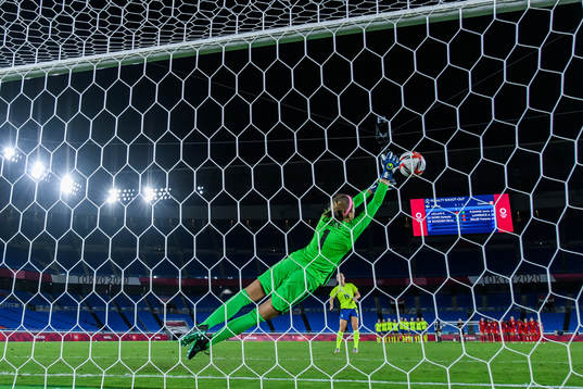 goalkeeper Stephanie Labbe of Canada saves a penalty from
