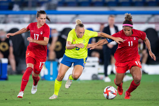 Jessie Fleming and Desiree Scott of Canada and Hanna