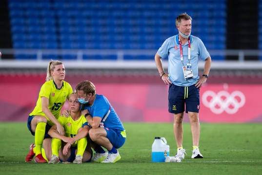 Caroline Seger of Sweden and Peter Gerhardsson, head coach
