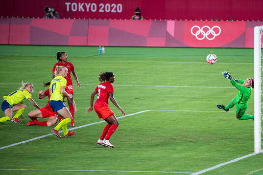 Sofia Jakobsson of Sweden and goalkeeper Stephanie Labbe of
