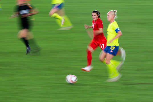 Jessie Fleming of Canada and Caroline Seger of Sweden  in