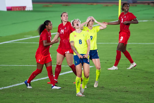 Lina Hurtig and Kosovare Asllani of Sweden looks dejected