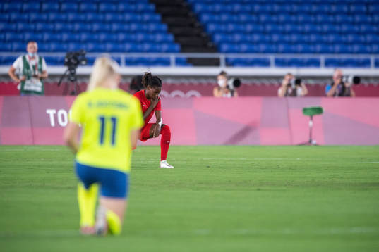 Stina Blackstenius of Sweden and Kadeisha Buchanan of