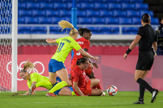 Kosovare Asllani and Stina Blackstenius of Sweden against