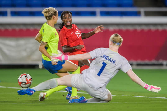 Nichelle Prince of Canada and Hedvig Lindahl of Sweden  in
