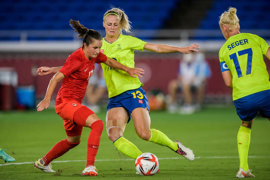 Jessie Fleming of Canada and Amanda Ilestedt of Sweden in