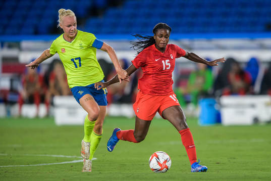 Caroline Seger of Sweden and Nichelle Prince of Canada in