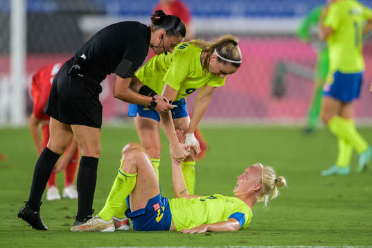 Kosovare Asllani and Caroline Seger of Sweden in the