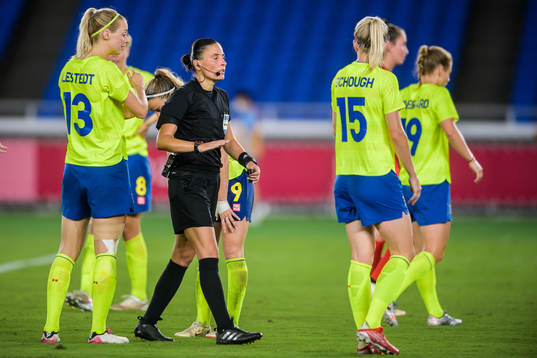 Players of Sweden reacts against Referee Anastasia