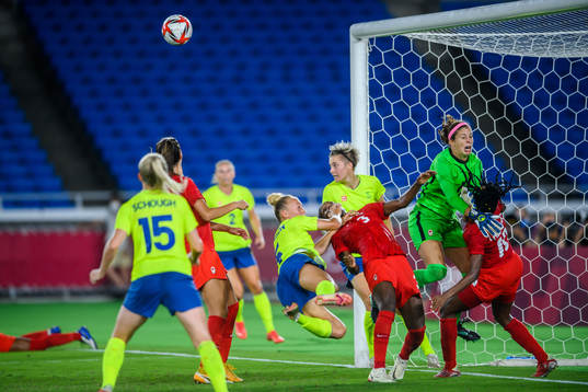 Hanna Bennison and Lina Hurtig of Sweden against goalkeeper