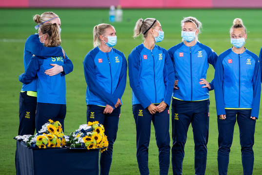 Goalkeeper Hedvig Lindahl of Sweden hugs a teammate at the