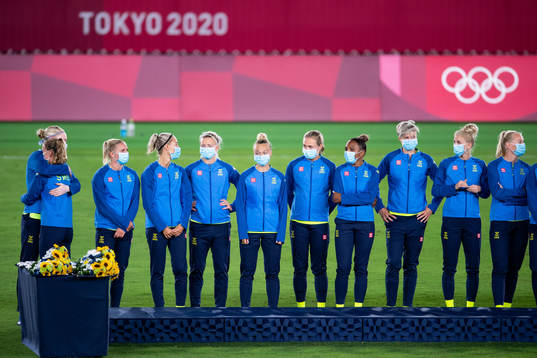 Goalkeeper Hedvig Lindahl of Sweden hugs a teammate at the