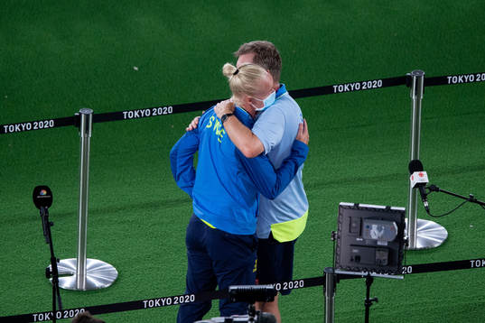 Caroline Seger in a hug with Peter Gerhardsson, head coach