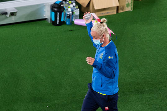 Caroline Seger of Sweden takes of her silver medal