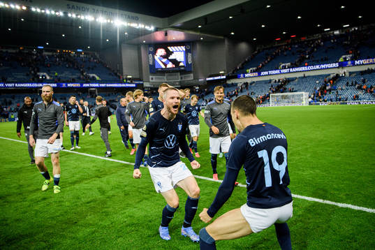 Lasse Nielsen and Veljko Birmancevic of Malmö FF celebrate