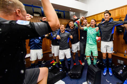 Players of Malmö FF celebrates in the locker room