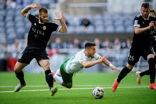 Bojan Roganovic of Cukaricki  and Astrit Selmani of Hammarby
