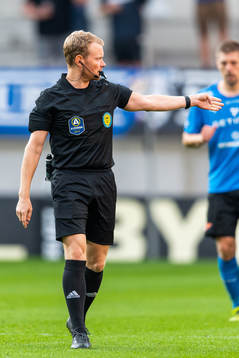 Domare Fredrik Klitte