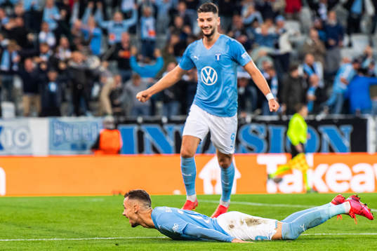 Veljko Birmancevic of Malmö FF celebrates scoring 1-0