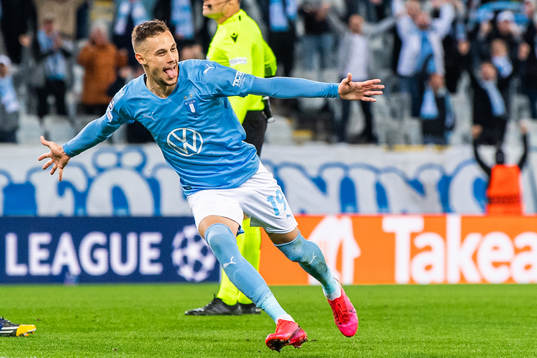 Veljko Birmancevic of Malmö FF celebrates scoring 1-0