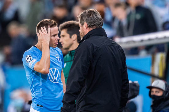 Niklas Moisander of Malmö FF leaves the pitch due to injury