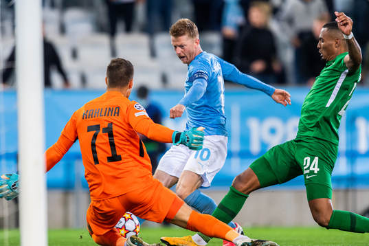 Goalkeeper Kristijan Kahlina and Olivier Verdon defend of