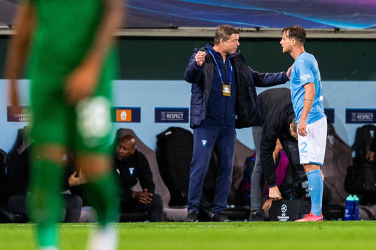 Jon Dahl Tomasson, head coach, talks to Eric Larsson of