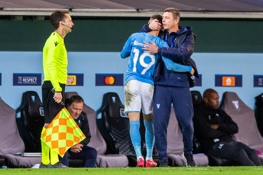 Jon Dahl Tomasson, head coach, embraces Veljko Birmancevic