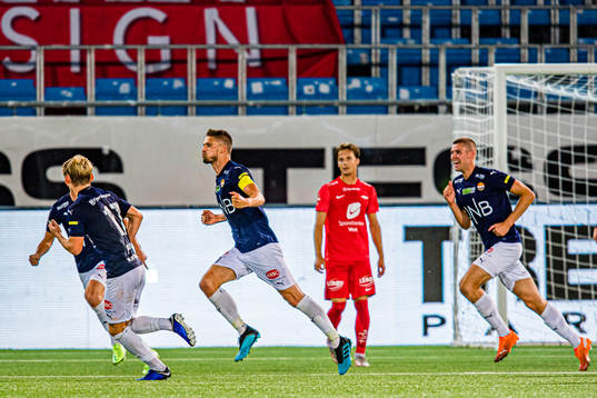 Gustav Valsvik of Strømsgodset celebrates