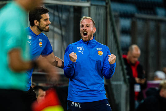 Håkon Wibe-Lund, head coach of Strømsgodset, celebrates