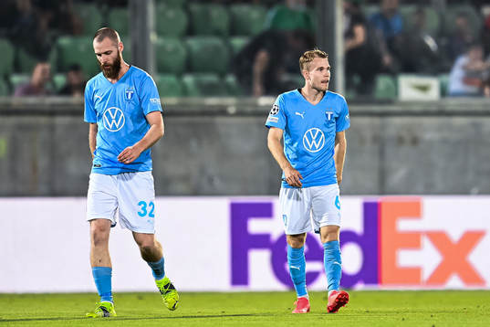 Jo Inge Berget and Oscar Lewicki of Malmö FF look dejected