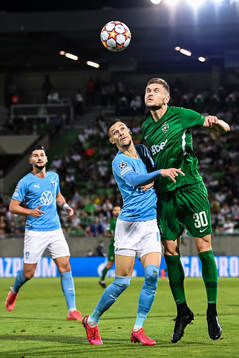 Veljko Birmancevic of Malmö FF and Igor Plastun of