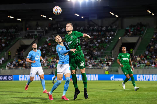 Veljko Birmancevic of Malmö FF and Igor Plastun of