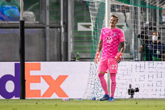 Goalkeeper Johan Dahlin of Malmö FF in pain