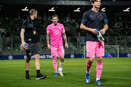 Goalkeeper Johan Dahlin of Malmö FF with a injured foot
