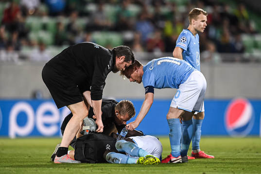 Bonke Innocent of Malmö FF receives medical attention