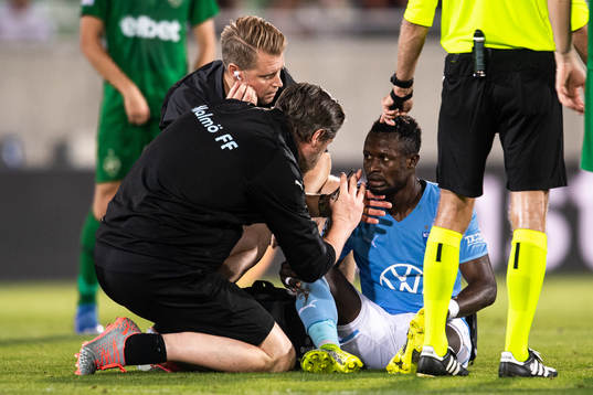 Bonke Innocent of Malmö FF receives medical attention