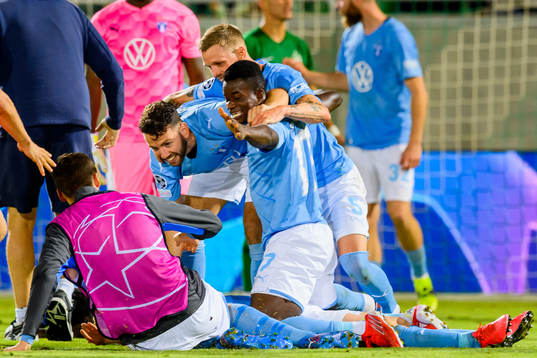 Erdal Rakip, Sören Rieks and Malik Abubakari of Malmö FF