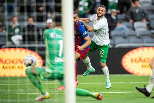 Mohanad Jeahze of Hammarby and goalkeeper Heinz Lindner of
