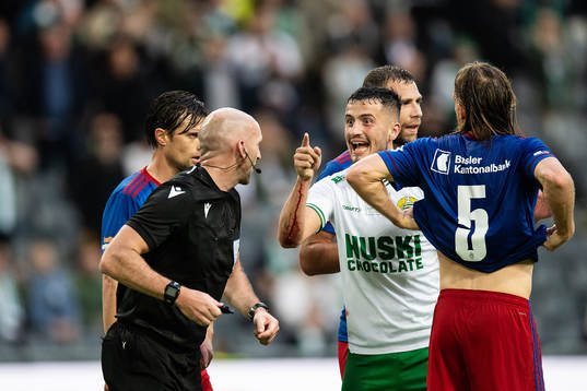 Astrit Selmani of Hammarby reacts to referee Bobby Madden