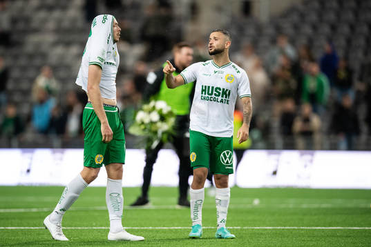 Jon Gudni Fjoluson and goalkeeper Darijan Bojanic of