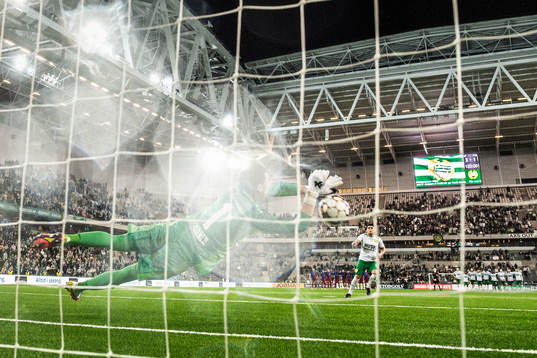 Goalkeeper Heinz Lindner of Basel saves a penalty from