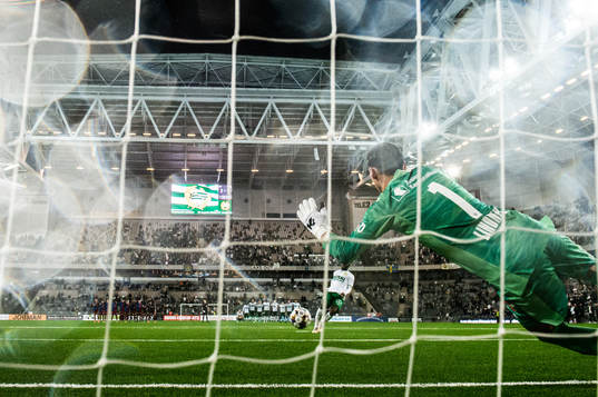 David Accam of Hammarby scores a penalty behind goalkeeper