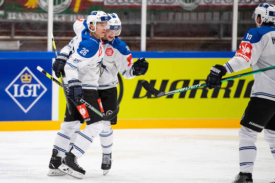 Reto Suri and Livio Stadler of Zug celebrate